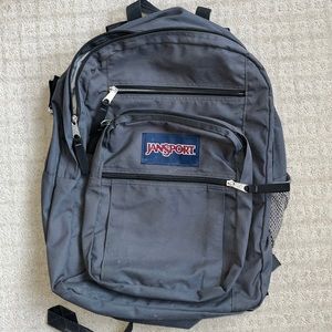 Jansport UNISEX Big Student Backpack. 5 pockets + water bottle holder.